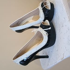 Michael Kors  platform/ stilleto shoes.  Size 6  Cream and Black colored. Size 6